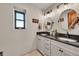 Modern bathroom with double vanity and updated fixtures at 6238 W 80Th Pl, Arvada, CO 80003