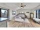 Spacious main bedroom with vaulted ceilings and a private balcony at 6238 W 80Th Pl, Arvada, CO 80003