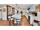 Modern kitchen with large island, stainless steel appliances, and ample counter space at 6238 W 80Th Pl, Arvada, CO 80003