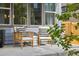 Inviting front porch featuring cozy seating, perfect for enjoying the outdoors at 1702 W 66Th Ave, Denver, CO 80221