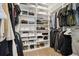 Walk-in closet with custom shelving for maximum storage at 1702 W 66Th Ave, Denver, CO 80221