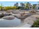 This community water feature offers artistic stone structures and cascading water at 1702 W 66Th Ave, Denver, CO 80221