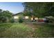 Spacious backyard with lush lawn, patio, and hot tub, ideal for outdoor relaxation and entertainment at 10462 Hoyt St, Westminster, CO 80021