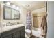 Well-maintained bathroom with tile shower and vanity with ample storage at 10462 Hoyt St, Westminster, CO 80021