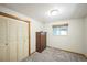 Bright bedroom with a closet and a window, ideal for a comfortable and organized living space at 10462 Hoyt St, Westminster, CO 80021