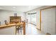 Bright dining area with a large bay window and light wood floors at 10462 Hoyt St, Westminster, CO 80021