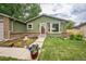 Charming single-Gathering home featuring a beautiful garden, mature trees, and an attached two-car garage at 10462 Hoyt St, Westminster, CO 80021