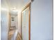 Light and airy hallway with wood-look floors and ample closet space offers great storage options at 10462 Hoyt St, Westminster, CO 80021
