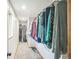 Spacious walk-in closet with clothing racks and shelves, perfect for organizing your wardrobe and accessories at 10462 Hoyt St, Westminster, CO 80021