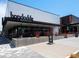 Exterior shot of Hopdoddy Burger Bar, showing its modern design and outdoor seating area at 760 Niagara St, Denver, CO 80220