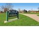View of Kittredge Park sign, playground, and lush green space, highlighting community amenities at 760 Niagara St, Denver, CO 80220