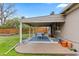 Covered back patio with room for outdoor dining at 760 Niagara St, Denver, CO 80220