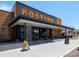 Exterior view of Postino restaurant, featuring its modern design and inviting entrance at 760 Niagara St, Denver, CO 80220