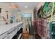 Organized potting shed with ample storage, shelving, and natural light, catering to gardening enthusiasts at 760 Niagara St, Denver, CO 80220