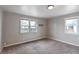 Comfortable bedroom with ample natural light and neutral tones, ready for personalization at 5185 Alcott St, Denver, CO 80221