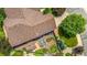 Expansive property showcasing a large roof, lush backyard garden, and ample outdoor space at 3494 S Otis Ct, Lakewood, CO 80227