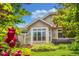 Inviting backyard featuring a large window view, perfect for enjoying serene outdoor views and abundant natural light at 3494 S Otis Ct, Lakewood, CO 80227