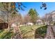 The property features a spacious backyard with a seating area and a fire pit at 3494 S Otis Ct, Lakewood, CO 80227