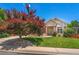Charming home featuring a well-maintained lawn and attractive landscaping at 3494 S Otis Ct, Lakewood, CO 80227