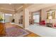 Spacious living room featuring elegant decor and hardwood floors at 3494 S Otis Ct, Lakewood, CO 80227