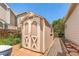 Backyard featuring a convenient storage shed, perfect for tools, equipment, and lawn care at 3494 S Otis Ct, Lakewood, CO 80227