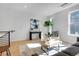 Sun-filled living room with modern furnishings, stylish decor, and an inviting atmosphere at 5142 W 44Th Ave, Denver, CO 80212