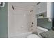 Clean bathroom featuring a tub and shower, updated fixtures, and ample lighting for your convenience at 800 N Washington St # 706, Denver, CO 80203