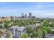 Scenic city view with lush green trees, nearby buildings, and a clear blue sky at 800 N Washington St # 706, Denver, CO 80203