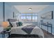 Inviting bedroom boasts ample natural light, hardwood floors, and tasteful furnishings, perfect for relaxation at 800 N Washington St # 706, Denver, CO 80203