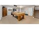 Finished basement showcasing a pool table and ample space for entertainment at 7106 S Kendall Blvd, Littleton, CO 80128