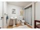 Clean bathroom featuring a pedestal sink, toilet, and shower with a stylish curtain at 7106 S Kendall Blvd, Littleton, CO 80128