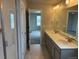 Bathroom with a walk-in shower and double vanity at 1783 Jennifer St, Brighton, CO 80601