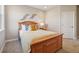 Comfortable bedroom with cozy bed, warm lighting, and serene decor at 17829 W 95Th Pl, Arvada, CO 80007