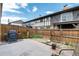 Private backyard with patio and grill area, perfect for entertaining at 3855 S Monaco St # 170, Denver, CO 80237