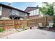 Private backyard patio with wooden fence and seating area at 3855 S Monaco St # 170, Denver, CO 80237