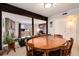 Charming dining room with wood table and chairs, near kitchen at 3855 S Monaco St # 170, Denver, CO 80237