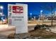 Nighttime view of the RTD Southmoor Station park-n-ride sign at 3855 S Monaco St # 170, Denver, CO 80237