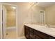 Bathroom with double vanity and a separate shower/tub at 13717 Ashgrove Cir, Parker, CO 80134