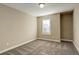 Bright bedroom featuring neutral walls and carpet at 13717 Ashgrove Cir, Parker, CO 80134