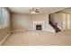 Bright living room with a fireplace and tile floors at 13717 Ashgrove Cir, Parker, CO 80134