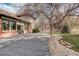 Large back deck is ideal for entertaining with a large deck and mature landscaping at 1036 Lexington Ave, Westminster, CO 80023