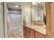 Bathroom features granite countertop vanity and shower/tub combo at 1036 Lexington Ave, Westminster, CO 80023