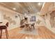 Basement dining area featuring modern lighting, hardwood floors, and neutral paint at 1036 Lexington Ave, Westminster, CO 80023