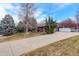 Long driveway leading to a brick home at 1036 Lexington Ave, Westminster, CO 80023