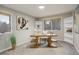 Home office with built-in shelving and large window at 1036 Lexington Ave, Westminster, CO 80023