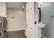 Convenient powder room with pedestal sink at 1036 Lexington Ave, Westminster, CO 80023