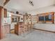 Living Room with wooden bar and shelves at 4198 Timbervale Dr, Evergreen, CO 80439
