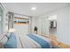 Cozy bedroom features soft lighting, plush bedding, and ample closet space at 1111 Monroe St, Denver, CO 80206