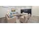 Inviting living room with stylish sofas, modern furnishings, and a cozy atmosphere, perfect for entertaining and relaxation at 1111 Monroe St, Denver, CO 80206