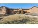Well-maintained brown apartments with landscaping and brown trim at 3335 S Ammons St # 103, Lakewood, CO 80227